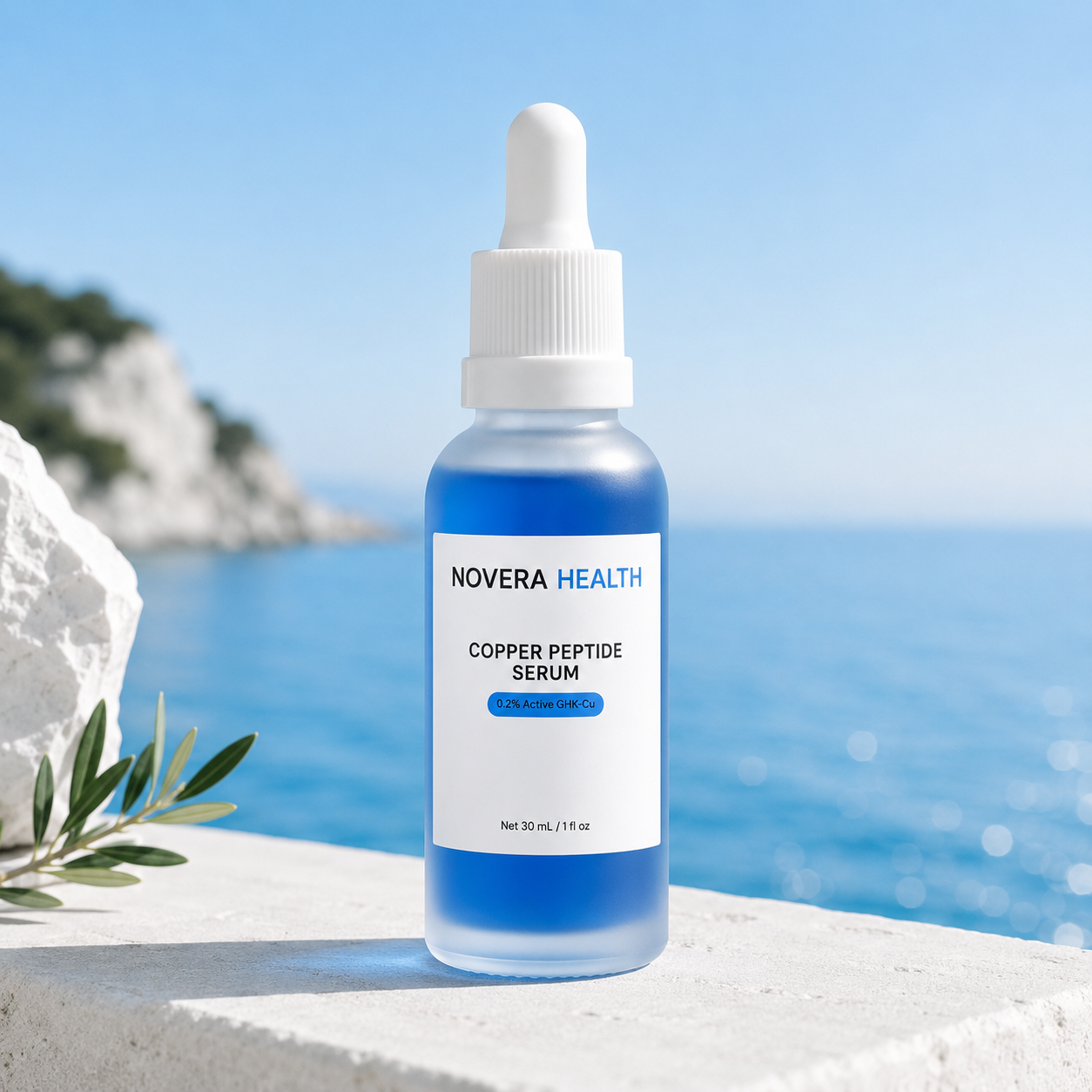 A dropper bottle of NOVERA HEALTH Copper Peptide Serum with blue liquid inside, set on a stone ledge with a blurred blue sea and sky background.
